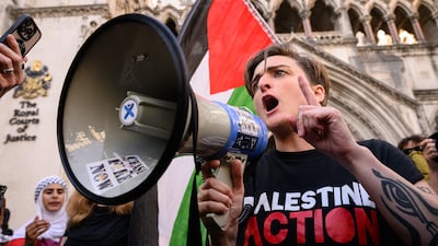 A Palestine Action activist outside the High Court in London. Getty Images