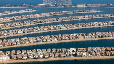 Residents in Palm Jumeirah were among those defrauded by a gang that hijacked mobile signals to send fraudulent banking messages. Bloomberg