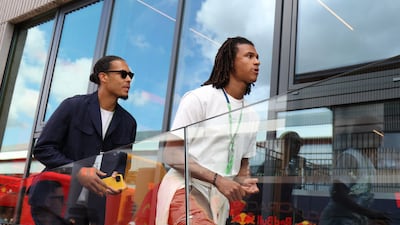 Liverpool star defender Virgil van Dijk and Manchester City's Nathan Ake arrive at Silverstone ahead of the British Grand Prix on July 3. Reuters
