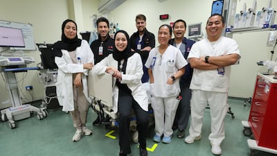 Dr Al Nuaimi with her tight-knit emergency team in Abu Dhabi