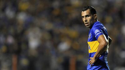 Boca's footballer Carlos Tevez is seen during their Argentina First Division football match against Newells at La Bombonera stadium, in Buenos Aires, Argentina, on February 20, 2016. AFP PHOTO / ALEJANDRO PAGNI / AFP / ALEJANDRO PAGNI