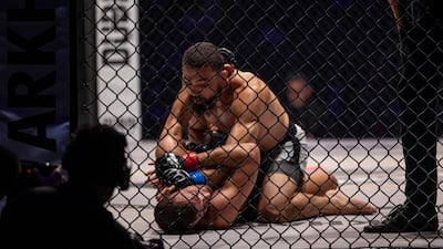In the featherweight tournament main event, the UAE's Mohammad Yahya faced Tunisia’s Mehdi Saadi (top).