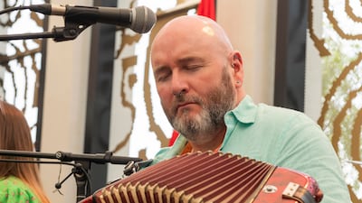 A musical performer takes centre stage.