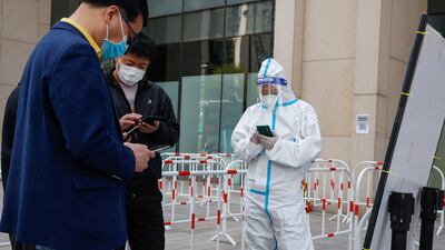 Shanghai reported 25,141 new asymptomatic coronavirus cases on April 12, 2022, up from 22,348 a day earlier. EPA