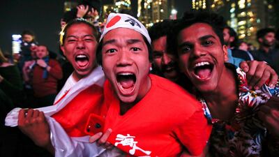 People gather near to Burj Khalifa prior to the fireworks. EPA