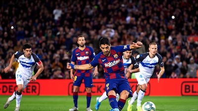 Luis Suarez scores Barca's fourth with a penalty. Getty