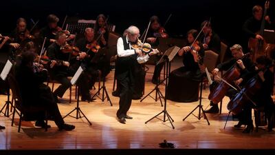 Latvian violinist Gidon Kremer performs with the Kremerata Baltica Chamber Orchestra at the Abu Dhabi Theatre in Abu Dhabi on October 28, 2014. Christopher Pike / The National