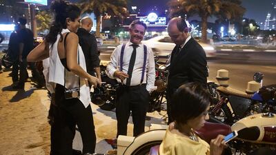 After a hot spring nights ride through the streets of Dubai with some over sixty dapper gentleman and genteel ladies, these riders caught their breath outside the biker Cafe on Jumeirah Beach road.