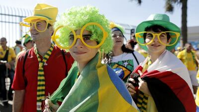 Brazil's football fans May have taken a 'football now, protests later' attitude now that the Fifa World Cup is here. Tolga Bozoglu / EPA