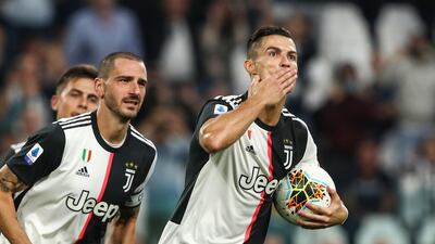 Juventus' Portuguese forward Cristiano Ronaldo celebrates after his penalty gave Juve a 2-1 lead against Hellas Verona. AFP