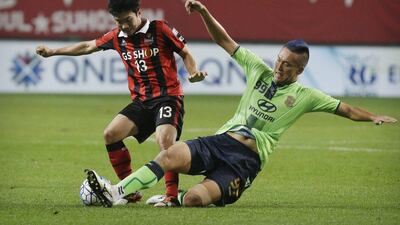 Jeonbuk Hyundai Motors, in green, ensured safe passage to the final thanks to their 4-1 first leg lead. Ahn Young-joon / AP Photo