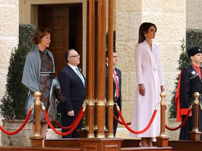 Jordan's Queen Rania wore all white, with Norway's Queen Sonja upon her arrival at the Royal Palace in Amman, Jordan. EPA