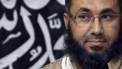 Mohamed Zahawi, head of the Benghazi brigade of Ansar al-Sharia, speaks in Benghazi on Tuesday. Mr Zahawi warned the United States on Tuesday against interfering in the country's crisis or face worse than their conflicts in Somalia Iraq, or Afghanistan. Esam Omran Al-Fetori / Reuters