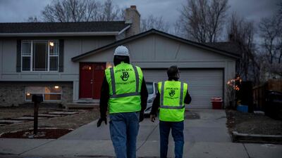 Construction crews survey damage from the debris at a property in Broomfield. AFP