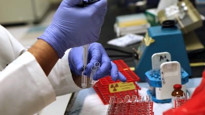 A medical technician tests to see the level of vitamin D in a person's blood. Even newborns can suffer from a deficiency, say doctors. Getty Images