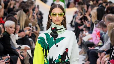 The jungle pattern of this jumper climbs around the neck. Valentino spring summer 2020