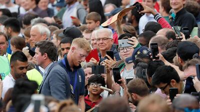 England's Ben Stokes signs autographs at the Oval in London one day after they won the Cricket World Cup in a final match against New Zealand. AP Photo