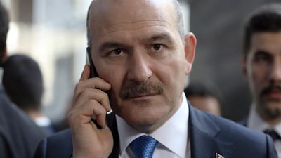 Turkey's Interior Minister Suleyman Soylu speaks on the phone in Ankara, Turkey. AP, file