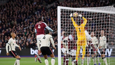 Liverpool's Alisson scores an own goal and West Ham United's first. Reuters
