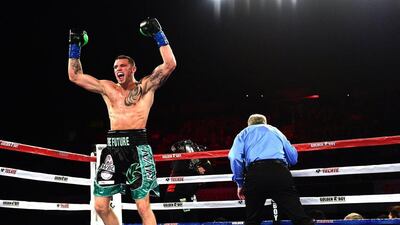 Joe Smith Jr celebrates after knocking Bernard Hopkins out of the ring. Harry How / Getty Images
