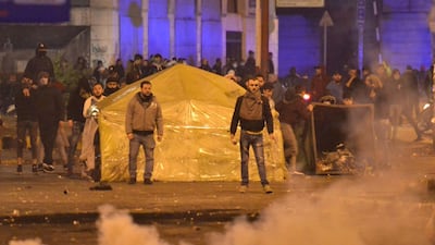 Lebanese anti-government protesters clash with security forces following a demonstration against dire economic conditions, in the northern city of Tripoli. AFP
