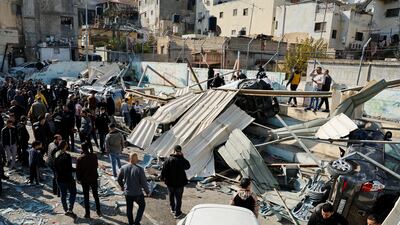 Palestinians inspect the damage following the Israeli raid in Jenin. Reuters