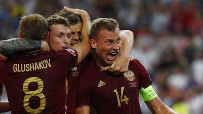 Russia’s Vasili Berezutski celebrates after scoring their first goal against England in their Euro 2016 match. Kai Pfaffenbach / Reuters
