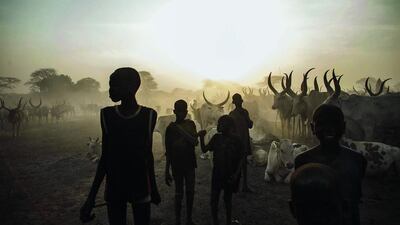 South Sudanese children from the Dinka ethnic group pose at cattle camp in the town of Yirol, in central South Sudan on February 12. UN leader Ban Ki-moon condemned on February 12 what he said was the use of cluster bombs in the war in South Sudan, a day after the opening of peace talks between South Sudan’s government and rebels. Troops loyal to President Salva Kiir and renegade soldiers who support his former vice president Riek Machar had been battling since mid-December. Fabio Bucciarelli / AFP
