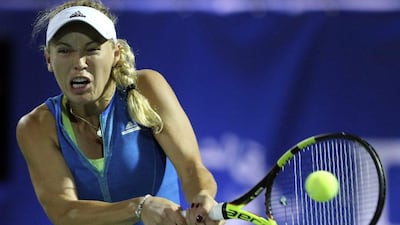 Caroline Wozniacki of Denmark returns the ball to Catherine Bellis of the US during a quarter-final match at the Dubai Tennis Championships in Dubai, UAE, on Thursday, February 23, 2017. Kamran Jebreili / AP Photo
