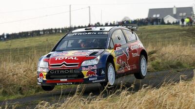 Sebastien Loeb and his Citroen get airborne on the Rally Australia course yesterday.