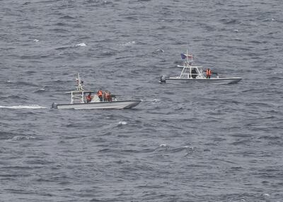 Members of Iran's Islamic Revolutionary Guard Corps Navy in the Strait of Hormuz, between the Arabian Gulf and the Gulf of Oman. AP