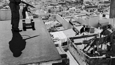 A French paratrooper in the Casbah in Algiers in June 1957. Nacerdine Zebar / Gamma-Rapho via Getty Images