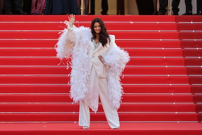Aishwarya Rai Bachchan wears an all-white look by Chinese designer Cheney Chan to attend the closing ceremony of the 79th annual Cannes Film Festival. Getty Images