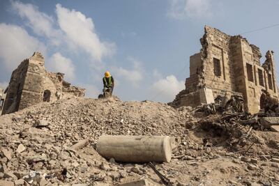 Workers sift through the remains of the Pasha's Palace in Gaza city, which once housed 40,000 artefacts representing the succession of civilisations in the region, on November 11, 2025. AFP