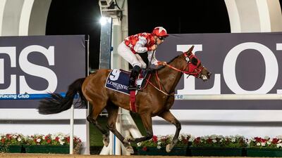 RB Money To Burn, ridden by Fabrice Veron, wins at Meydan Racecourse in January. Antonie Robertson/The National