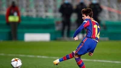 Barcelona's Ricard Puig scores the fifth and winning penalty in the shootout. Getty