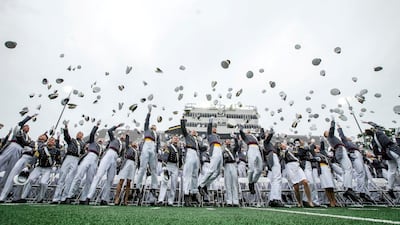 Cadets throw their hats in the air, as is traditional, at a commencement ceremony for the US Military Academy, at West Point, New York State. Reuters