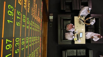 Dubai Financial Market Company says it ‘cannot confirm or deny’ speculation over a merger with the Abu Dhabi Securities Exchange. AFP PHOTO/Karim Sahib