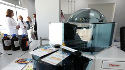 Above, the Thermo Fisher facility during its inauguration at Dubiotech in Dubai yesterday, April 28. Pawan Singh / The National