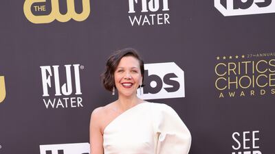 Maggie Gyllenhaal wears a white Chloe gown. AFP