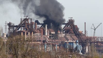 Smoke rises above the Azovstal steel works in the southern Ukrainian port city of Mariupol on April 25. Reuters