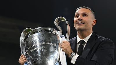 Manchester City chairman Khaldoon Al Mubarak poses with the European Cup. AFP