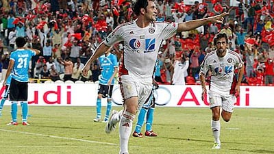Bare celebrates his first goal for Al Jazira.