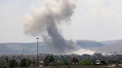 Smoke billowing from the Palestinian camp of Yarmouk, south of the Syrian capital Damascus. AFP