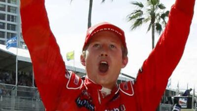Ryan Briscoe celebrates after winning the non-chmpionship Indy Racing League at Surfers Paradise.
