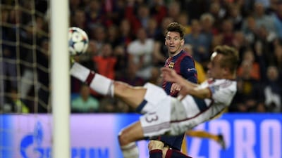Barcelona's Lionel Messi scores the second goal against Bayern Munich on Wednesday to make it 2-0 in the Champions League semi-final first leg. Lluis Gene / AFP