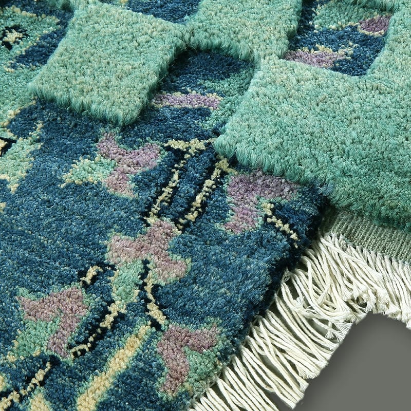 Detail of a carpet designed by Nada Debs for FBMI. Ten UAE residents and artists are designing carpets to be woven by women in Afghanistan Photo: FBMI