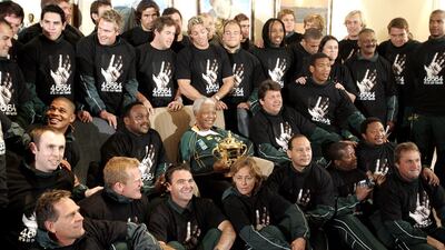 Mandela with the 2007 Rugby World Cup-winning Springboks. Gianluigi Guercia / Reuters