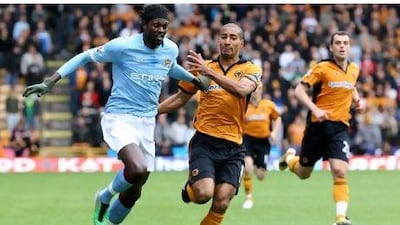 Manchester City's Emmanuel Adebayor, left, could be heading to White Hart Lane.