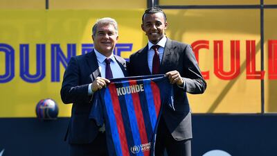 Barcelona's new French defender Jules Kounde with president Joan Laporta. AFP